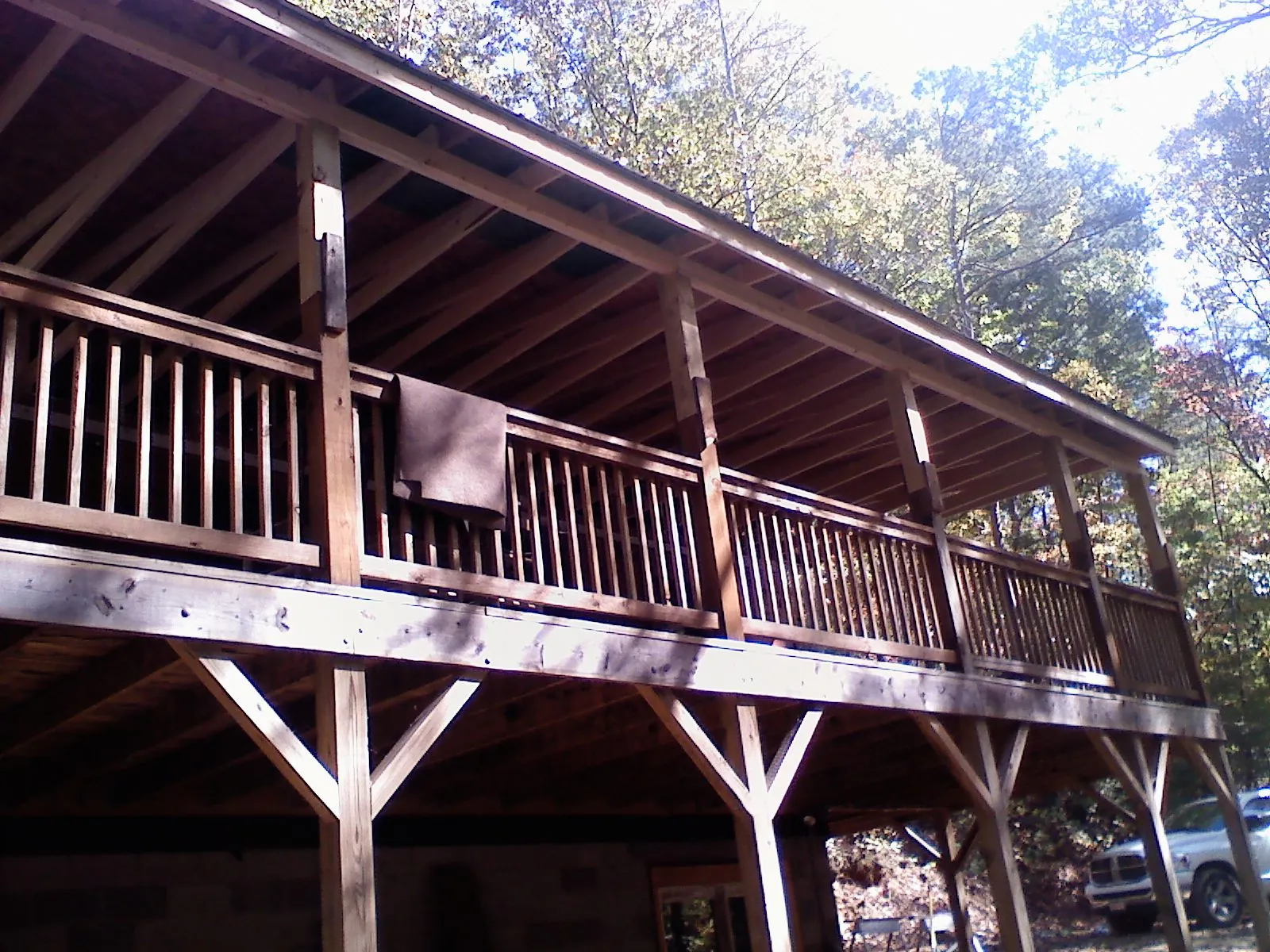 Timber framing under a new elevated porch and deck — Roof Leak Repair in Windham by Roofing Brothers